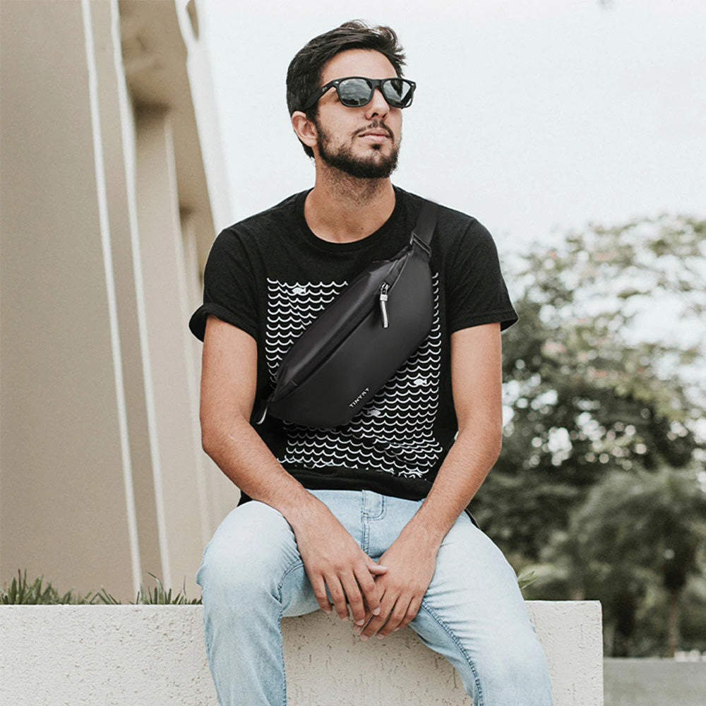 Hands-free unisex waist pack for travel, sport, & outdoor adventures. Water-resistant multi-pocket design.