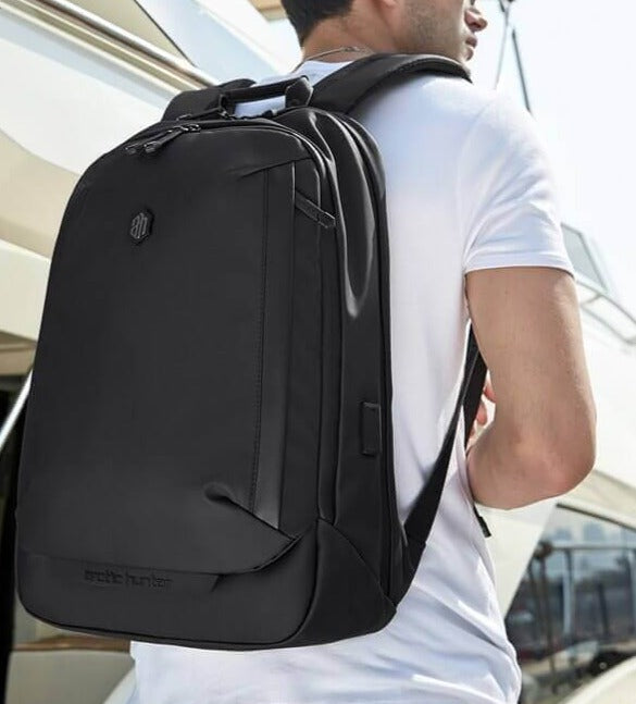 Unisex water-resistant multi-compartment backpack, perfect for travel & outdoor hiking adventures.