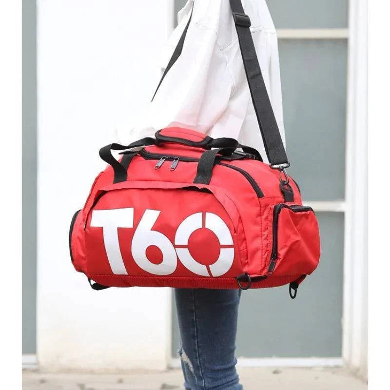 Waterproof travel duffel bag in grey, showcasing its durable nylon material and shoulder strap