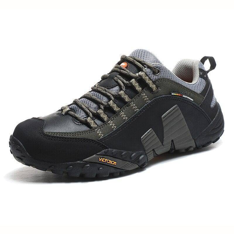 Unisex waterproof hiking boots on a rocky trail, highlighting their durability and grip