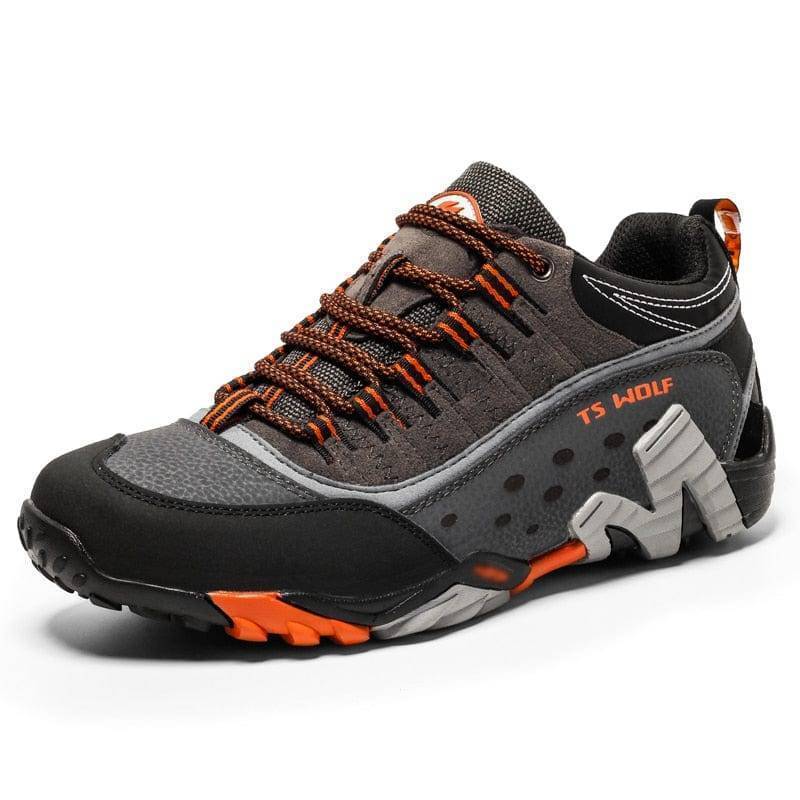 Waterproof leather trekking boots, unisex design, shown with mud splashes after a hike