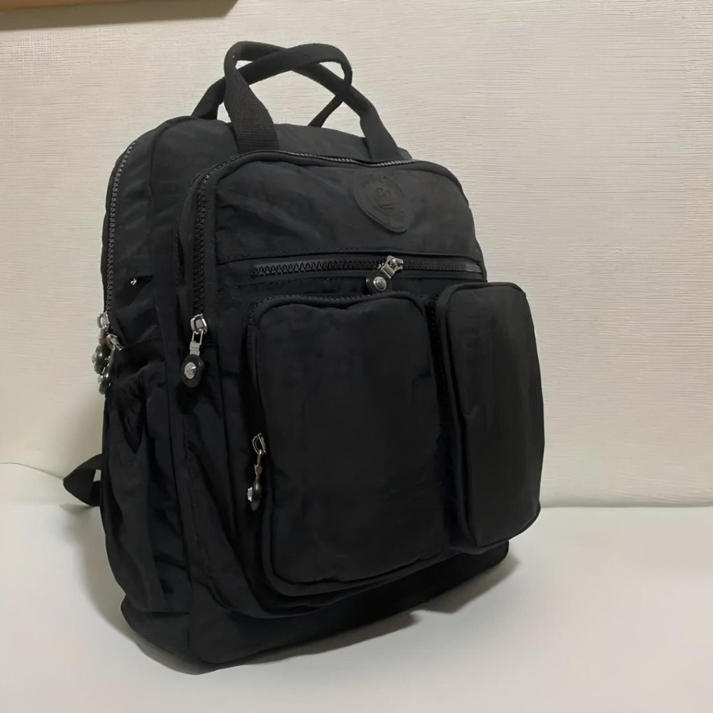 Unisex waterproof urban backpack with multiple pockets, ideal for daily commute & travel.