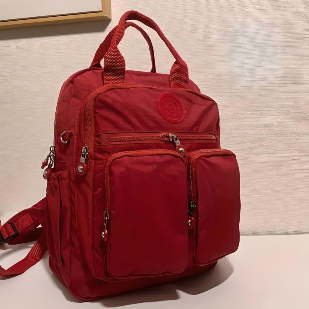 Modern waterproof travel bag. Urban backpack with multiple compartments for organized packing.