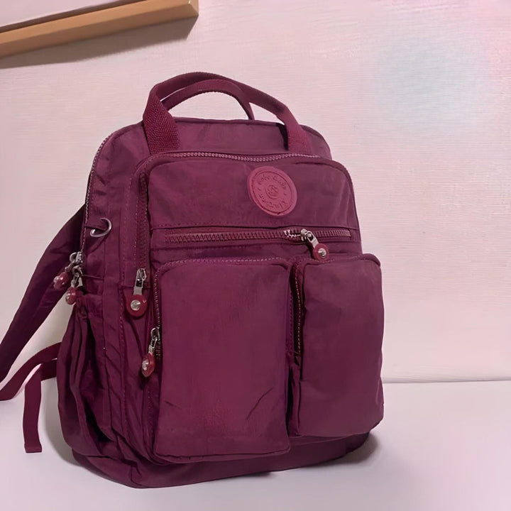 High-quality waterproof commuter backpack. Durable unisex design with secure multi-pocket storage.