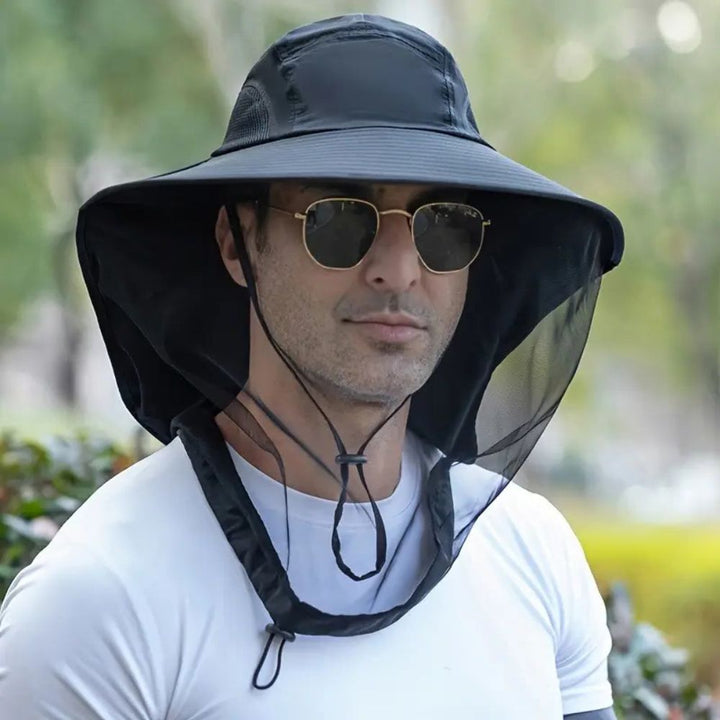 Unisex wide brim sun hat with mosquito net, face flap & neck protection for hiking, fishing, camping, UV safety.