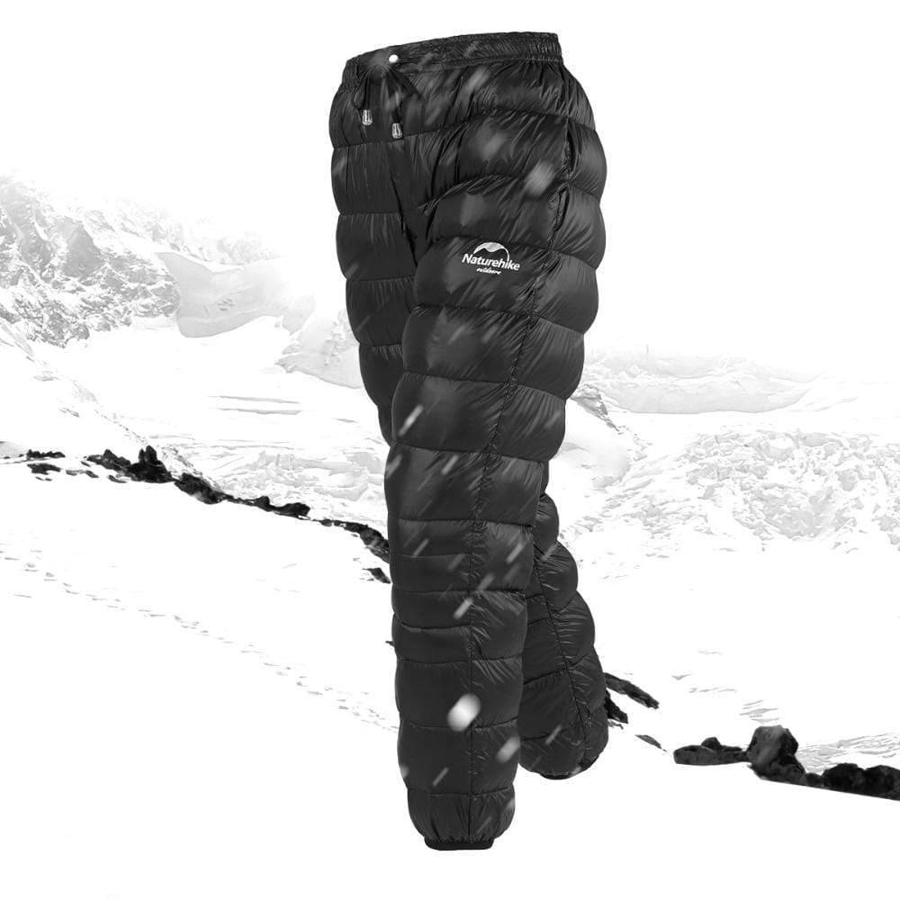 Close-up of thermal down insulated hiking pants fabric, showing weatherproof material