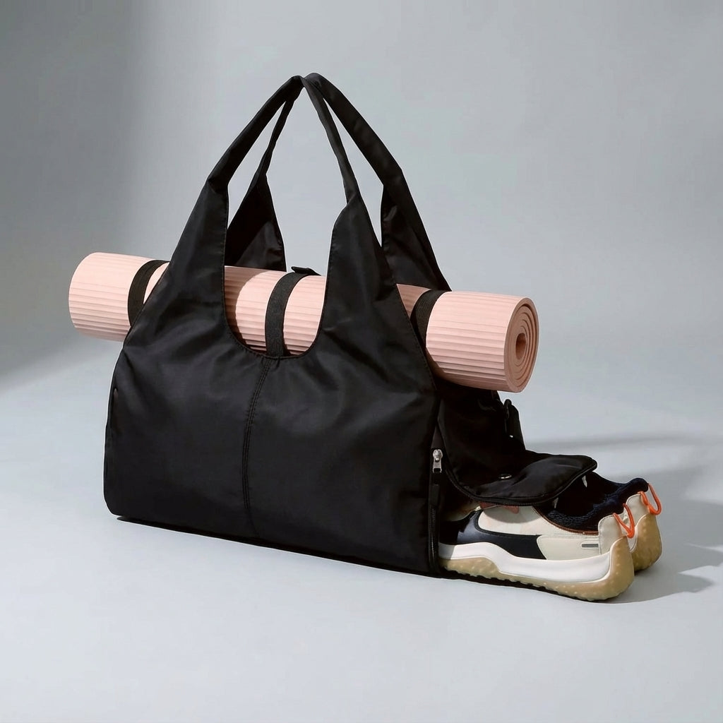 Yoga duffel bag showcasing side shoe compartment, wet pocket, and spacious main storage area.