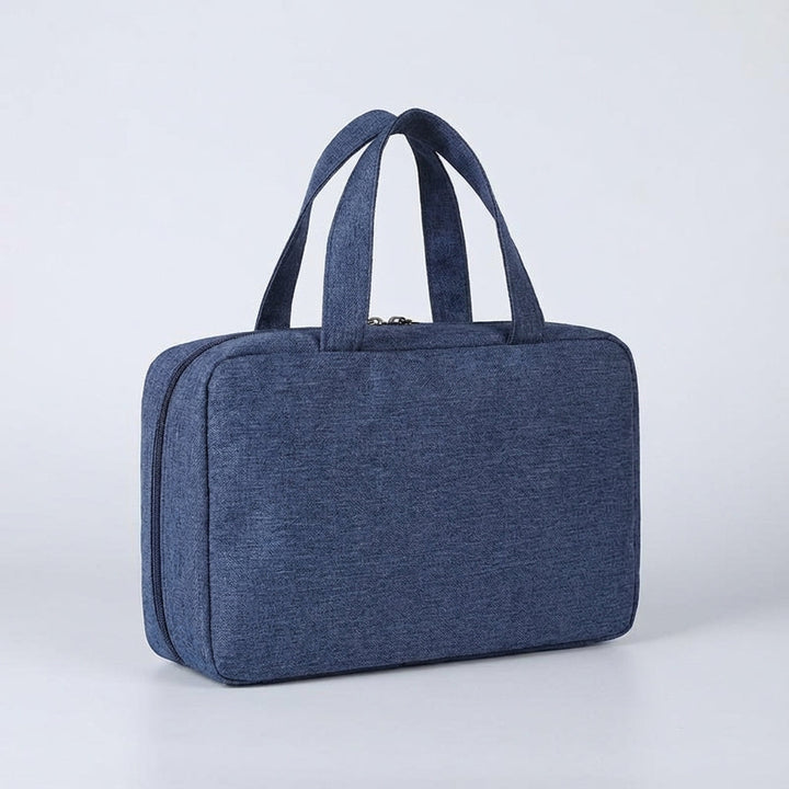 Compact & foldable unisex travel toiletry organizer, a must-have for any trip. Keep items secure.