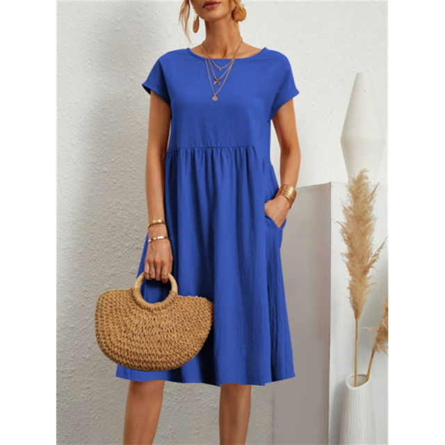 "Vestito midi estivo donna elegante poliestere, taglio largo, orlo ampio, colori vibranti, perfetto per occasioni estive."