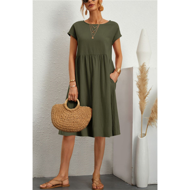 "Vestito midi estivo donna elegante poliestere, taglio largo, orlo ampio, colori vibranti, perfetto per occasioni estive."