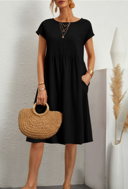 "Vestito midi estivo donna elegante poliestere, taglio largo, orlo ampio, colori vibranti, perfetto per occasioni estive."