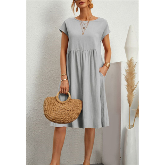 "Vestito midi estivo donna elegante poliestere, taglio largo, orlo ampio, colori vibranti, perfetto per occasioni estive."
