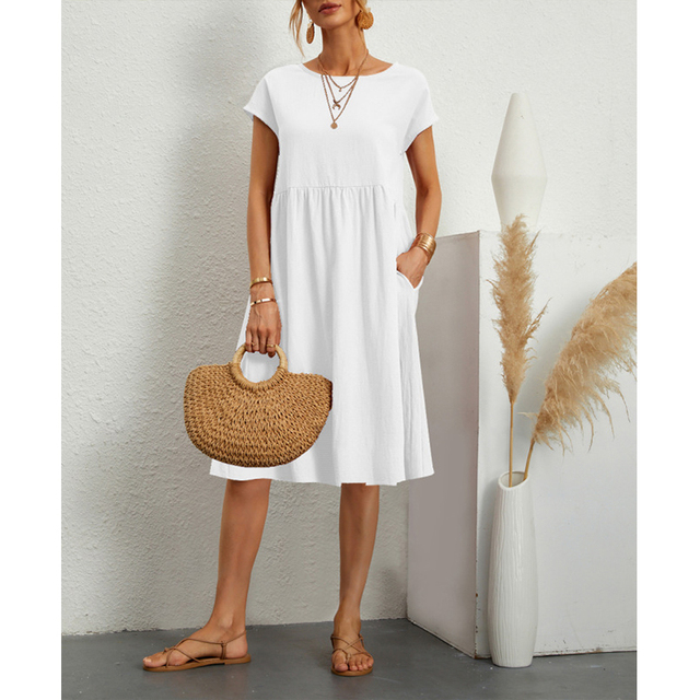 "Vestito midi estivo donna elegante poliestere, taglio largo, orlo ampio, colori vibranti, perfetto per occasioni estive."