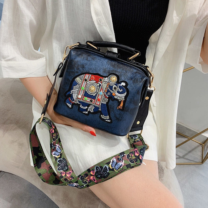 Intricately designed embroidered mandala shoulder bag for a chic bohemian look.