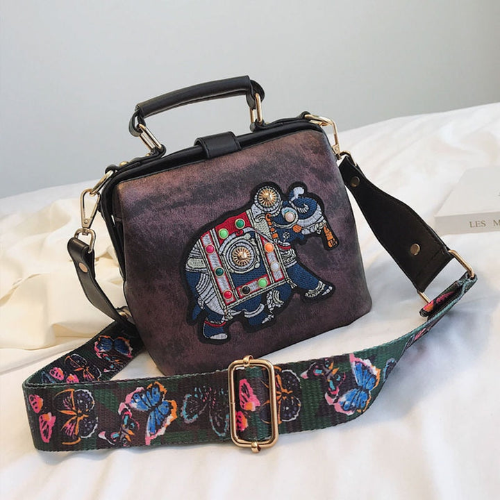 Bohemian style women's crossbody bag with stunning embroidered mandala artwork.