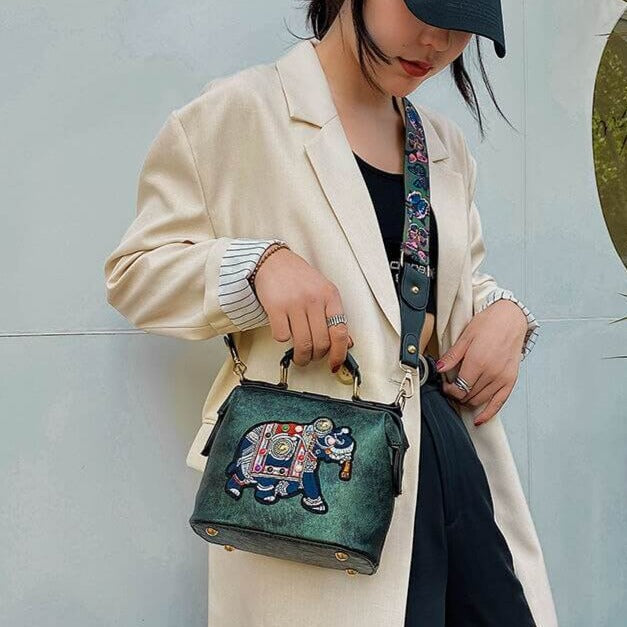 Chic women's accessory: an embroidered mandala bohemian purse with a long strap.