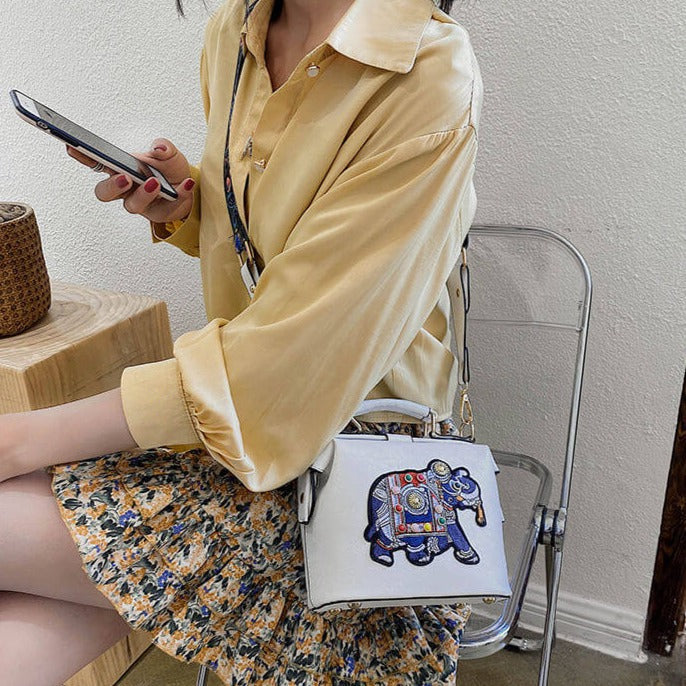 Unique embroidered mandala design on a versatile women's shoulder/crossbody bag.