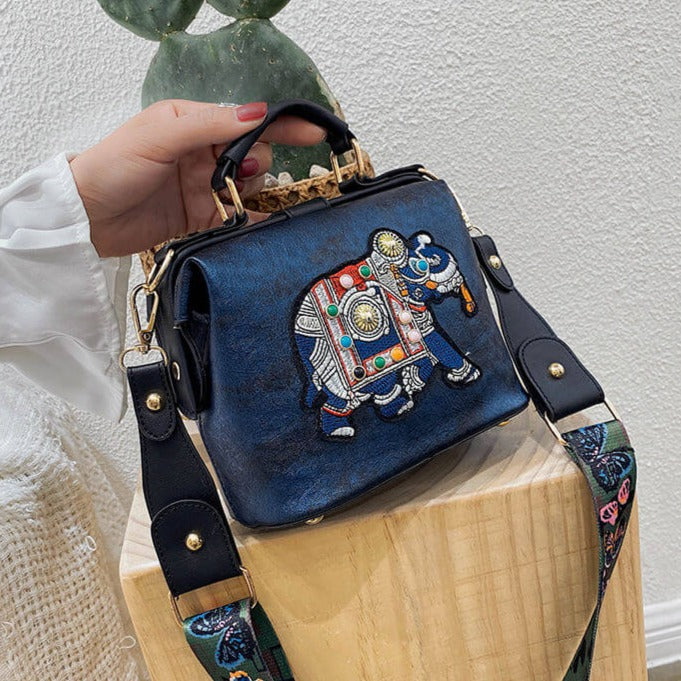 Stylish women's purse, featuring a colorful embroidered mandala pattern.