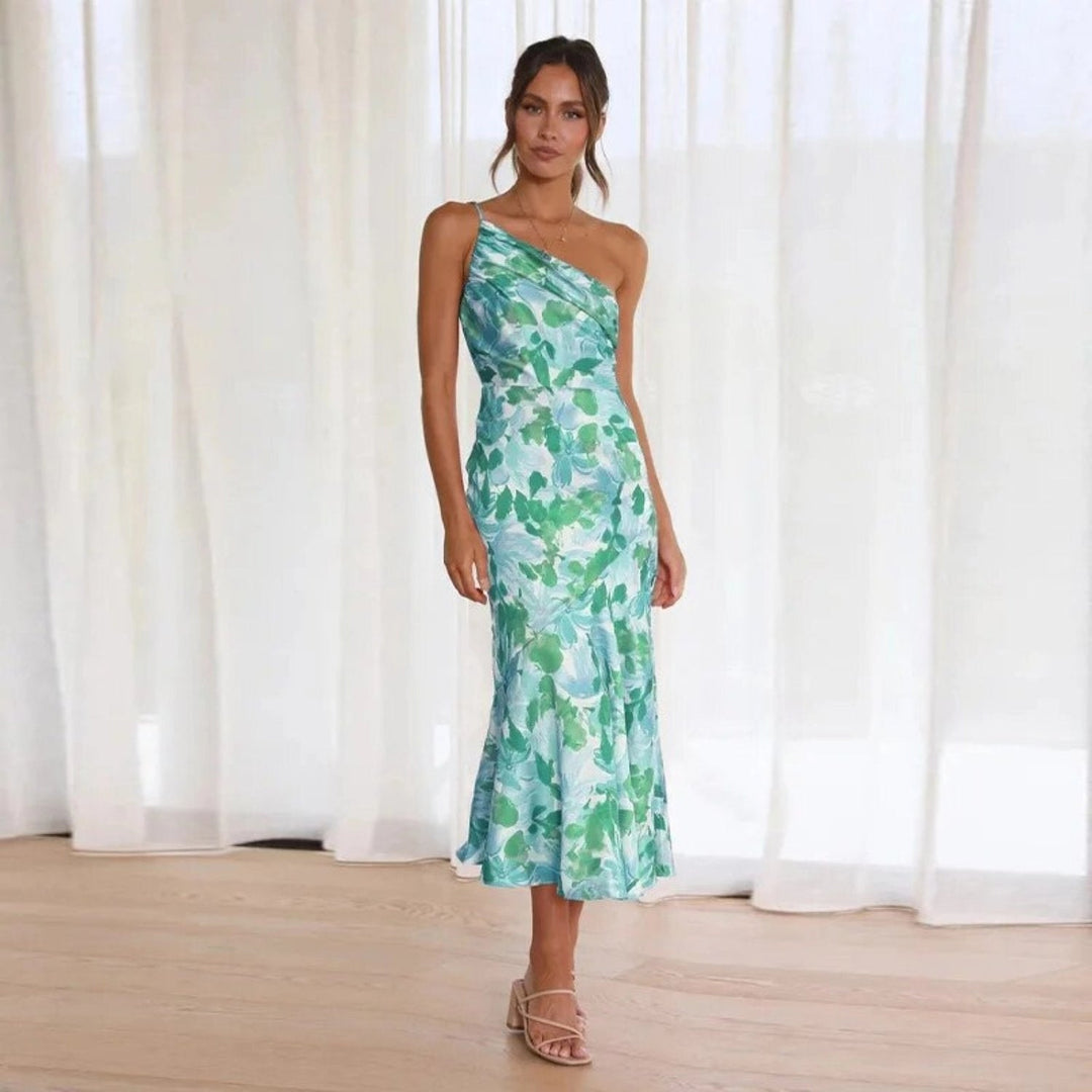 Elegant women's floral midi dress, asymmetric cut, sleeveless, ideal for summer occasions & day wear.
