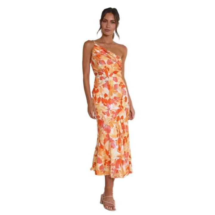 Sleeveless floral asymmetric midi dress for women, flowing hem, vibrant and elegant summer fashion.