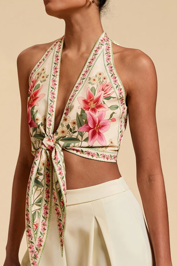 Comfortable women's sleeveless halter top with vibrant floral print, ideal for summer and beach days.
