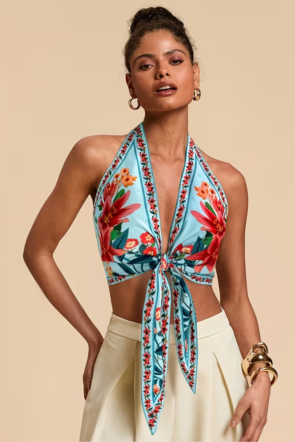 Women's vibrant floral halter top, an essential beach style and summer vacation outfit piece.