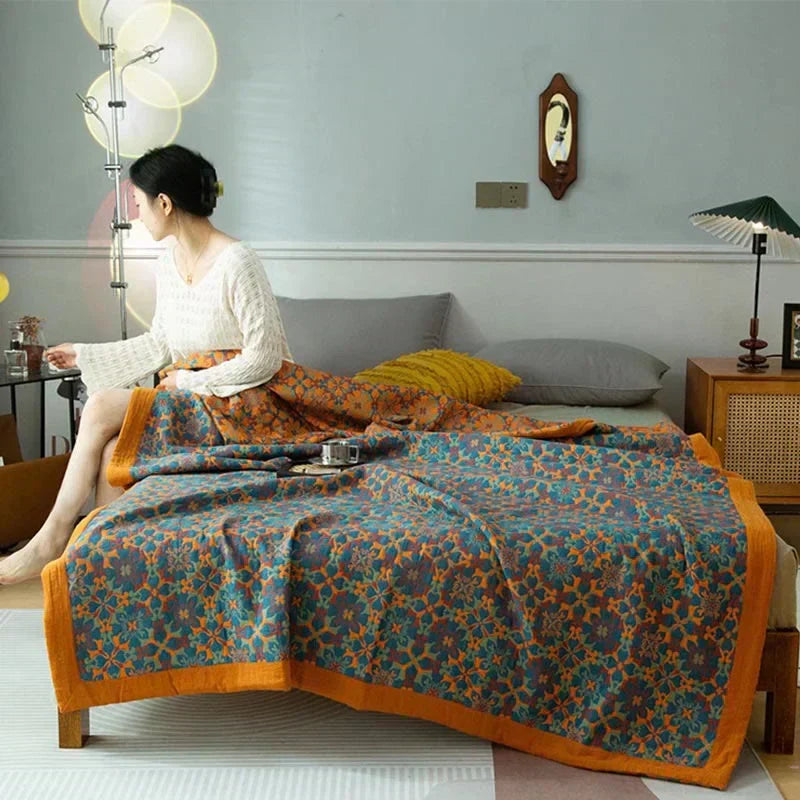Vibrant orange & blue six-layer cotton duvet quilt. Comfortable, eco-friendly bedding for your bedroom.
