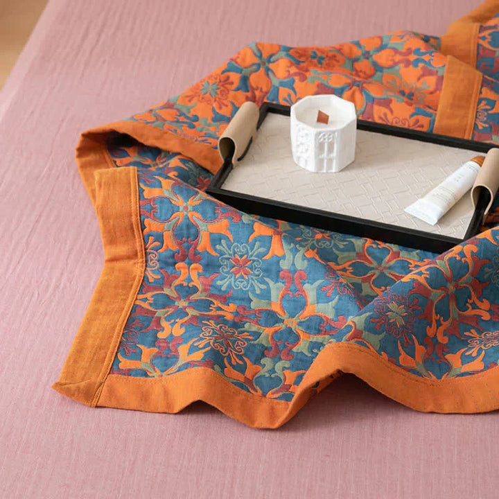 Beautiful orange & blue six-layer cotton quilt. Durable and soft duvet, perfect for vibrant bedroom bedding.