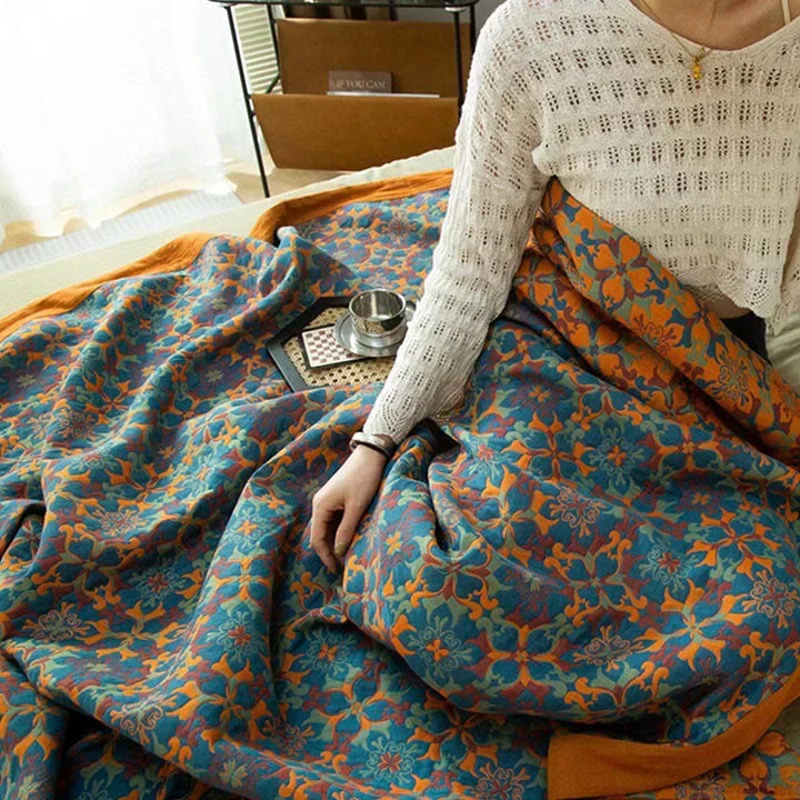 Soft, comfortable orange & blue six-layer cotton quilt. Eco-friendly duvet bedding for a cozy bedroom.
