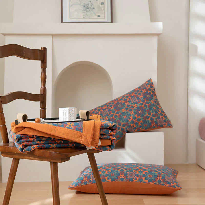 Stylish orange & blue cotton quilt. Vibrant six-layer duvet adds warmth & color to any bedroom decor.