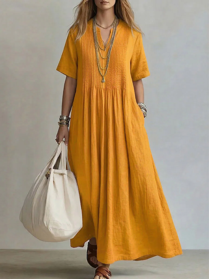 Comfortable women's vibrant V-neck midi dress, offering flowing style for casual chic & summer events.