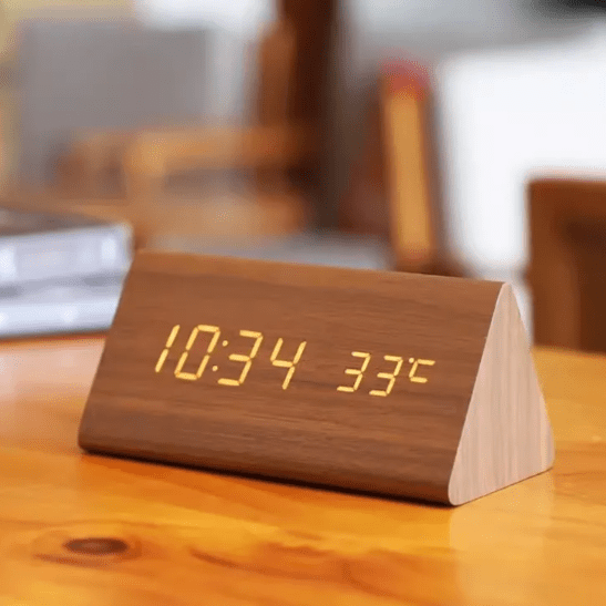 Voice activated LED wooden clock, modern smart digital desk clock for contemporary home decor.