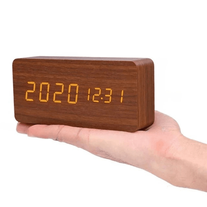 Battery powered voice activated LED wooden clock, a smart and portable modern home decor item.
