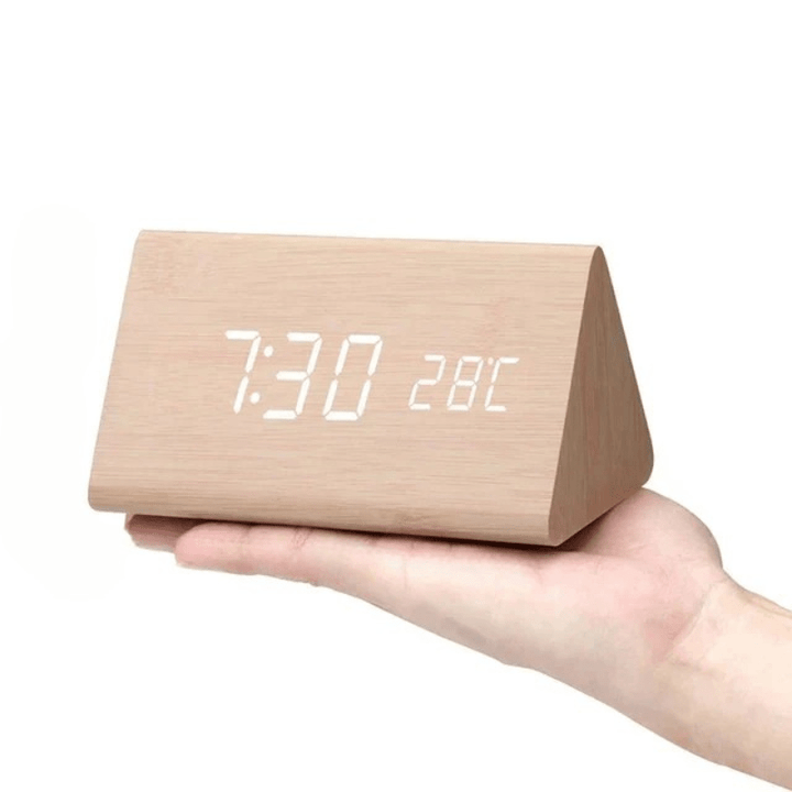 Sleek voice activated wooden LED clock for smart time display, perfect for a modern bedroom.