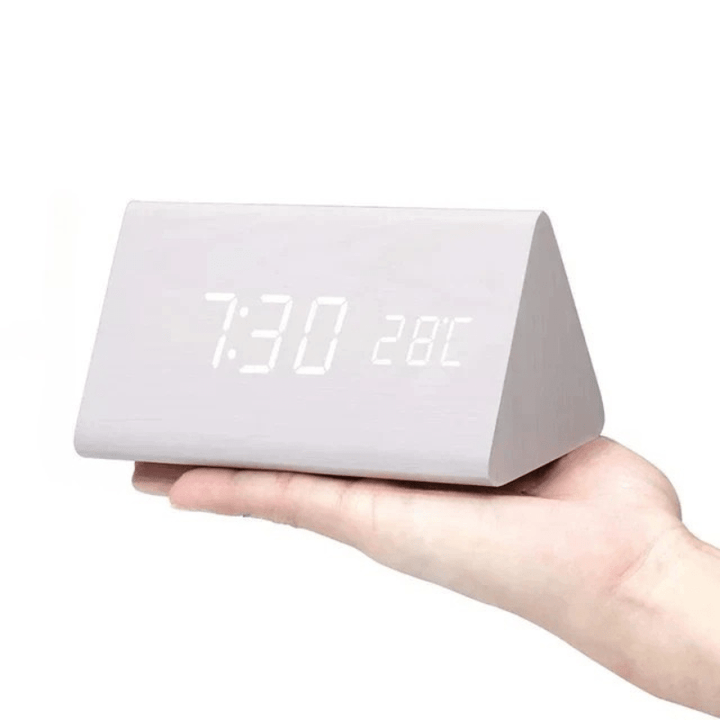 Modern minimalist voice activated wooden LED digital clock, a stylish timekeeping solution.