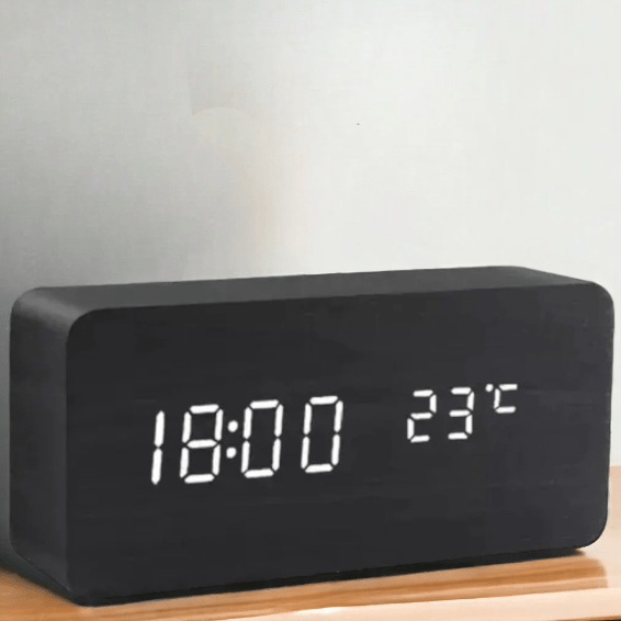 Stylish voice activated LED wooden table clock, battery or USB powered, for smart time display.