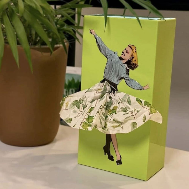 Modern Whimsical Dancer decorative tissue box cover, adds playful style to any room.