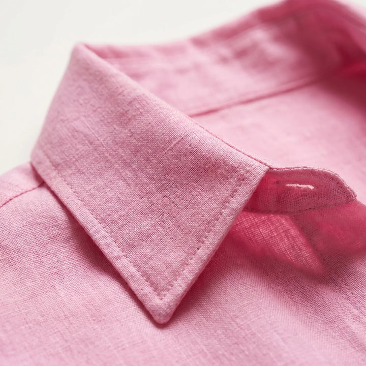 Versatile women's oversized button-down shirt, ideal for layering or as a casual long sleeve top in summer fashion.