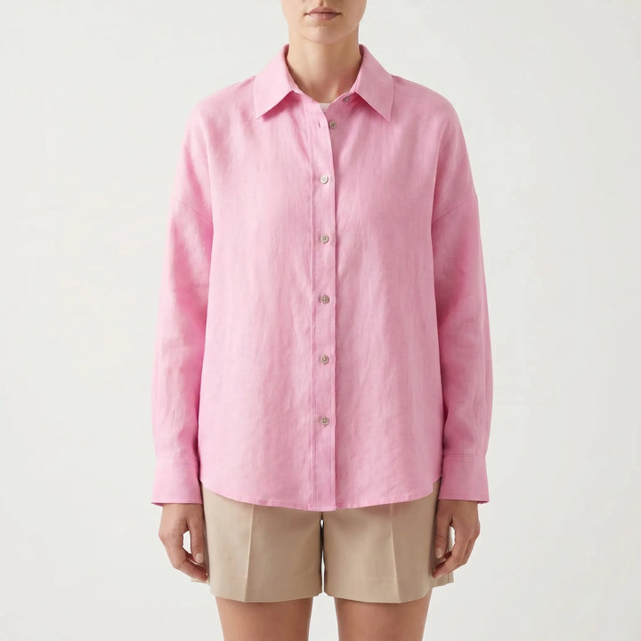 Classic women's long sleeve oversized button-down shirt, a relaxed fit wardrobe essential for timeless casual style.