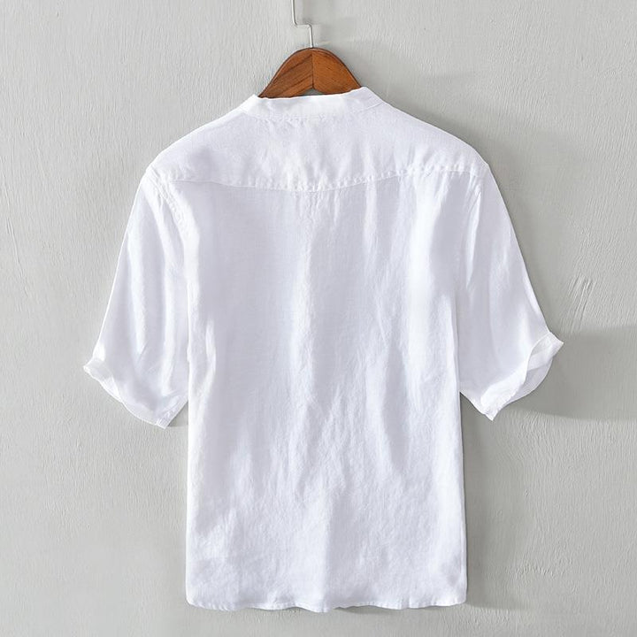 Men's relaxed fit casual button-up shirt, versatile summer wear. Breathable collared top for everyday style.
