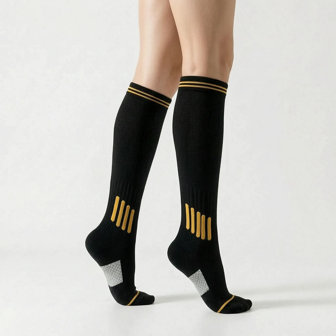 Stylish white knee-high sport socks, essential women's activewear.