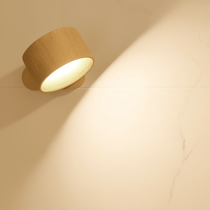 Modern wireless LED wall light, rechargeable with remote control, stylish home accent for any room.