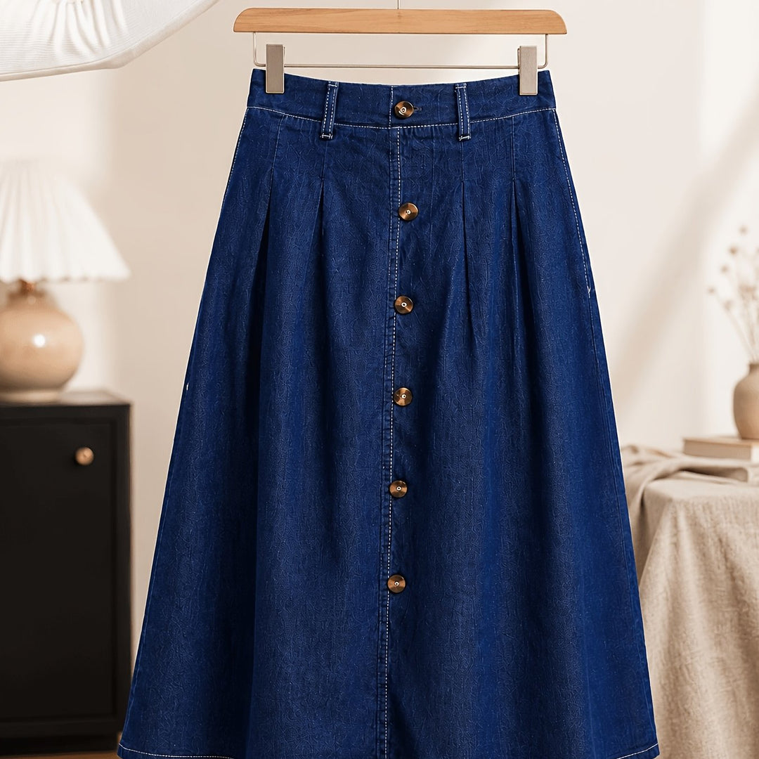 Blue denim A-line midi skirt with a full button front and pleated design, perfect for women's casual chic.