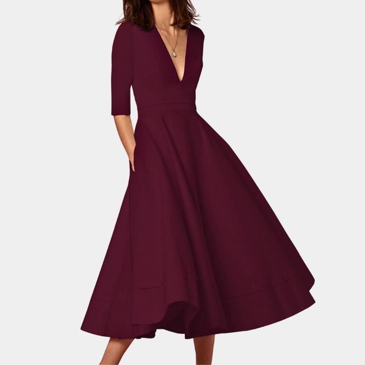Stylish women's A-line midi dress, sleeveless, with a trendy side slit. Ideal for summer & versatile fashion.