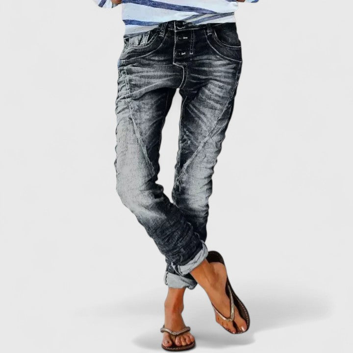 Distressed look women's acid wash skinny jeans. Trendy vintage denim with distinctive contrast stitching for fashion.