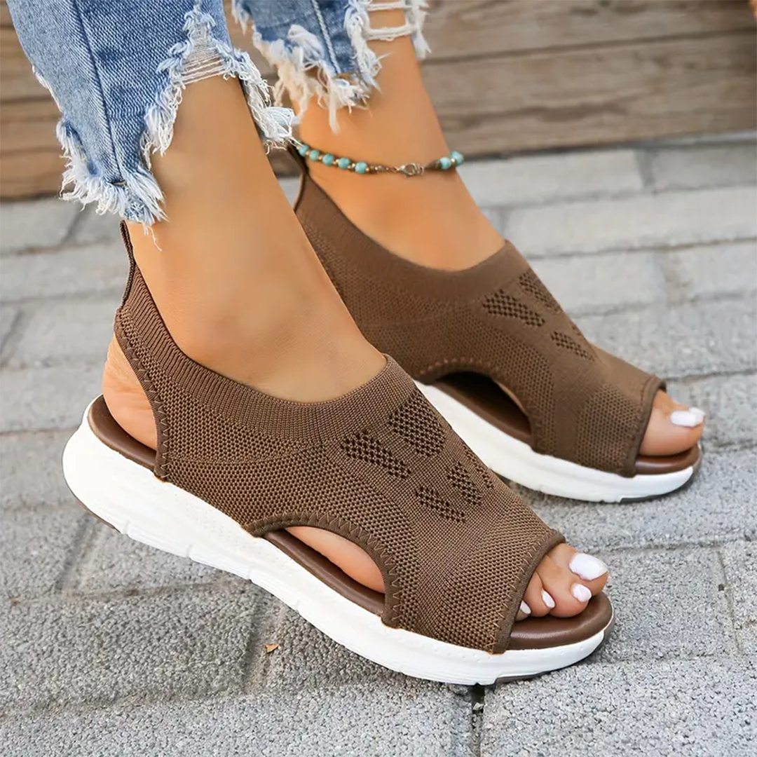 Women's comfort sandals with adjustable straps, orthopedic arch support for active lifestyles.