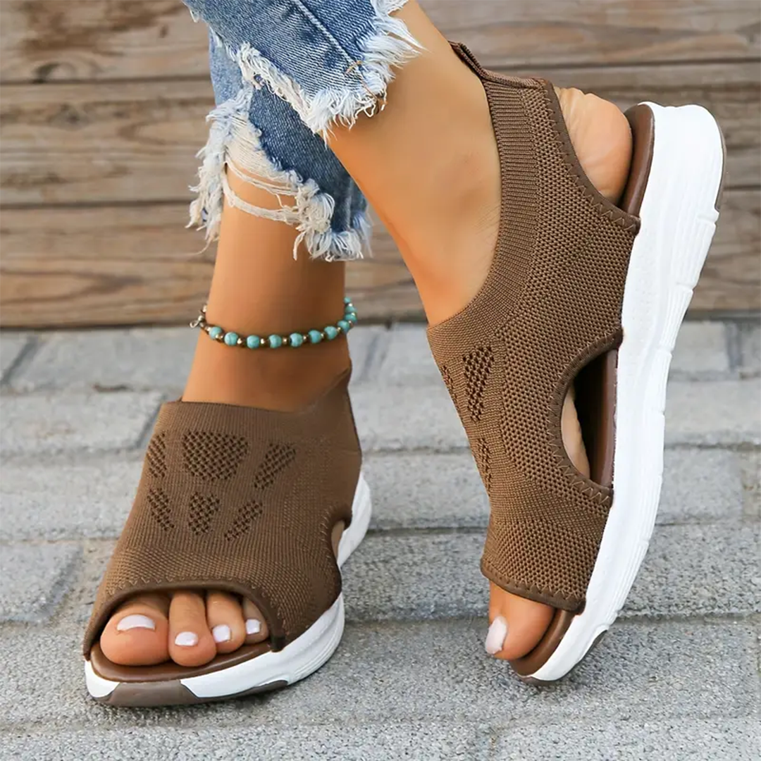 Relief-focused orthopedic women's sandals, adjustable for various foot conditions.