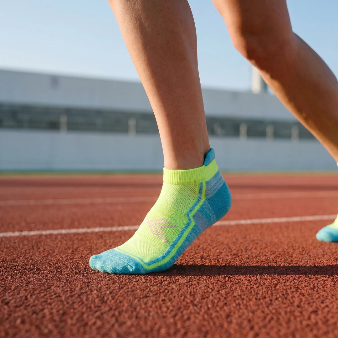 Women's ankle-length performance athletic socks for sports & workouts.