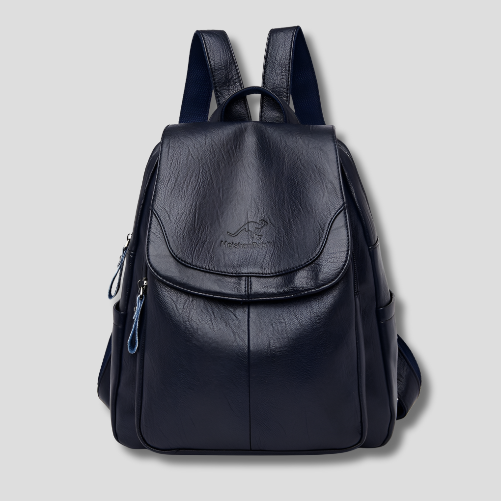 Organized women's flap backpack, ideal for commuting. Anti-theft features keep items secure and tidy.