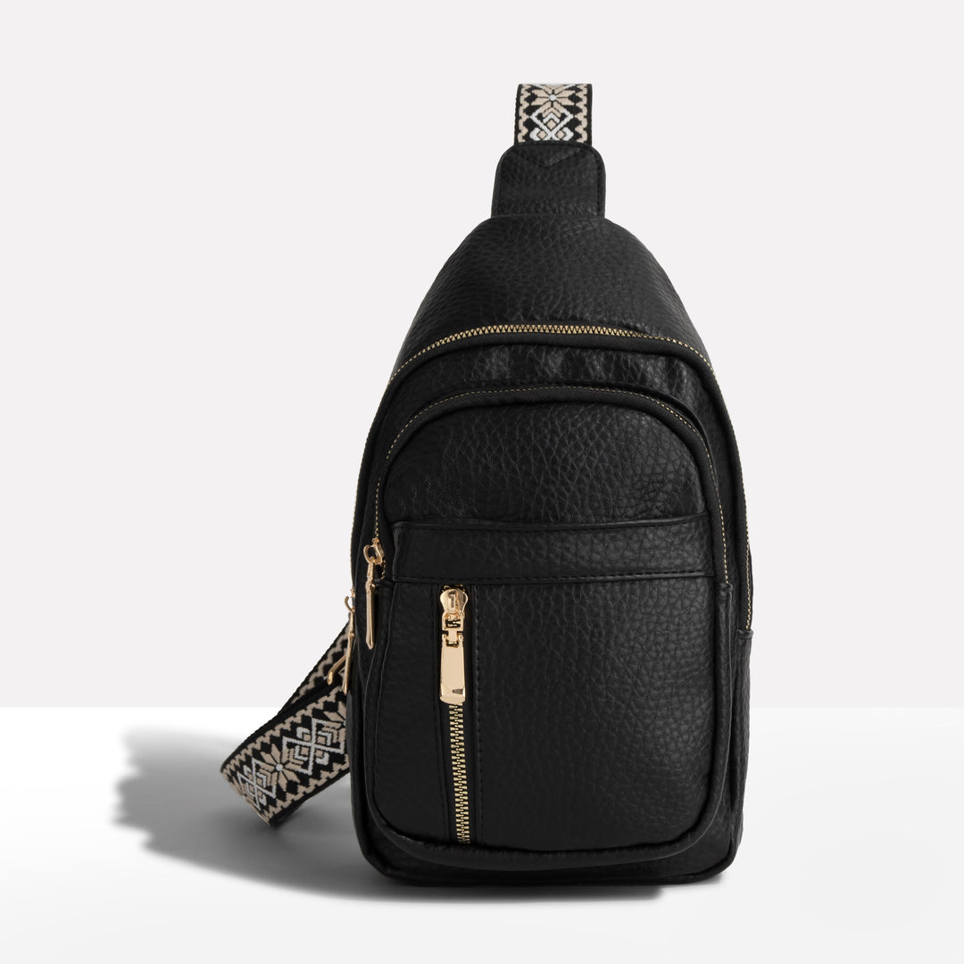 Women's anti-theft sling bag with stylish patterned strap. Secure crossbody purse for daily use & travel.